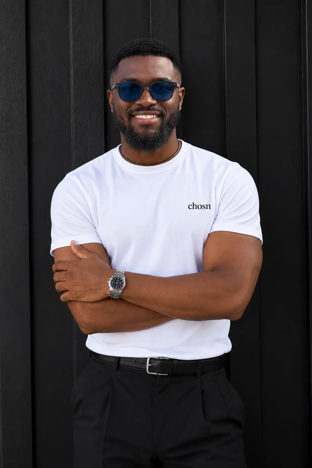 The chosn model in the white Signature Tee, after dark